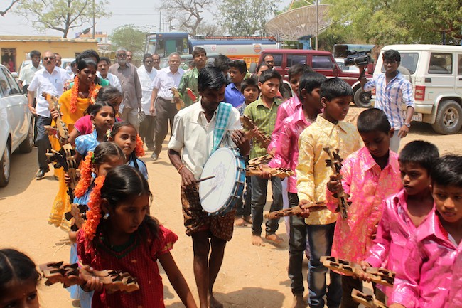 Children give a welcome to T Vijay Kumar, advisor to the state govt (agriculture) for the Rayalseema Crop Biodiversity Festival in Kadiri on April 27.